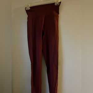 really cute maroon leggings. with mesh cheetah print on the bottom